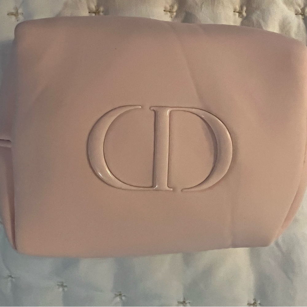 New Christian Dior light pink neoprene makeup case.